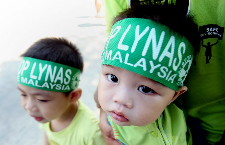Two young children wearing headbands take part in an 'Occupy Balok-Gebeng' rally against the Australian miner Lynas Corporation in Kuantan, some 260km east of Kuala Lumpur, on June 24, 2012. u00e2u20acu201d AFP pic
