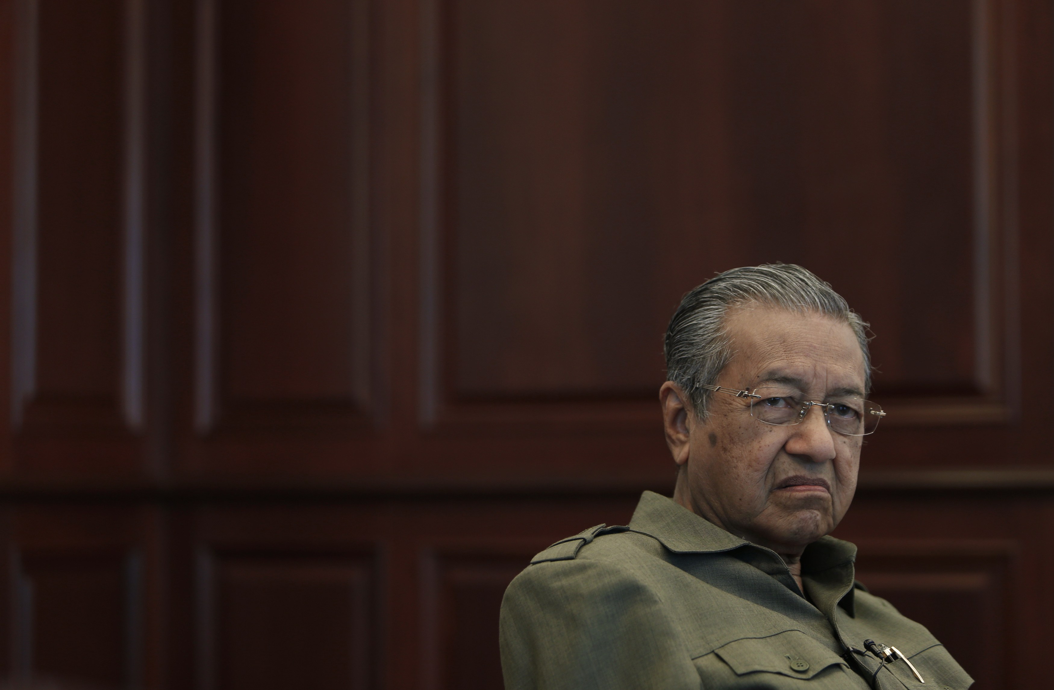 Former Malaysian prime minister Tun Mahathir Mohamad speaks during an interview at his office in Kuala Lumpur October 18, 2013. u00e2u20acu201d Reuters pic