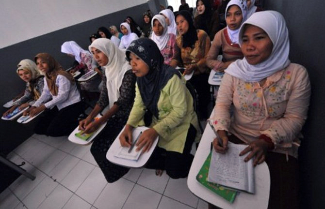 The sheer number of illegal maids has given rise to the issue of harbouring. u00e2u20acu201c AFP pic