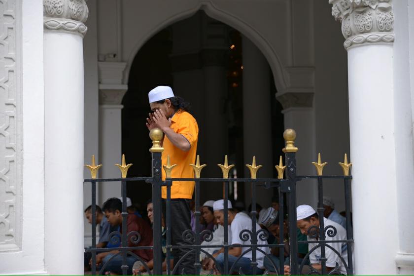 A man joining others Muslim for the Friday prayer at Majid Kapitan Keling in Penang, January 3, 2014. u00e2u20acu201d Picture by K.E. Ooi