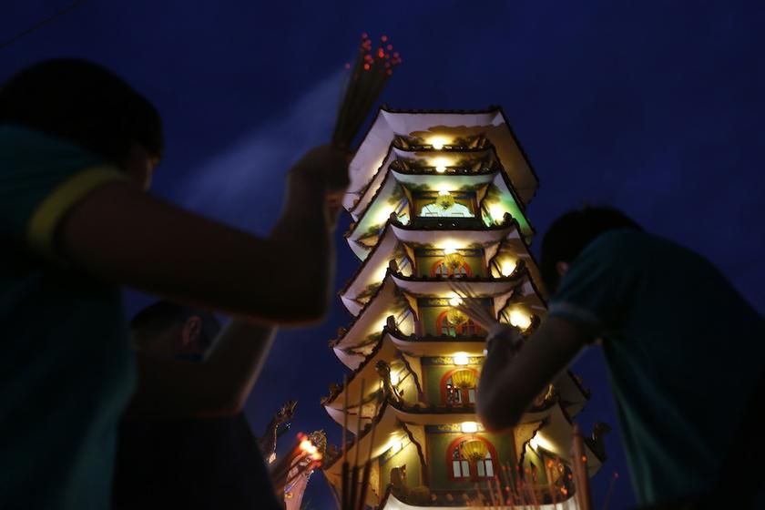 People pray at a temple during the Nine Emperor Gods Festival in Kuala Lumpur October 5, 2013. u00e2u20acu201d Reuters pic
