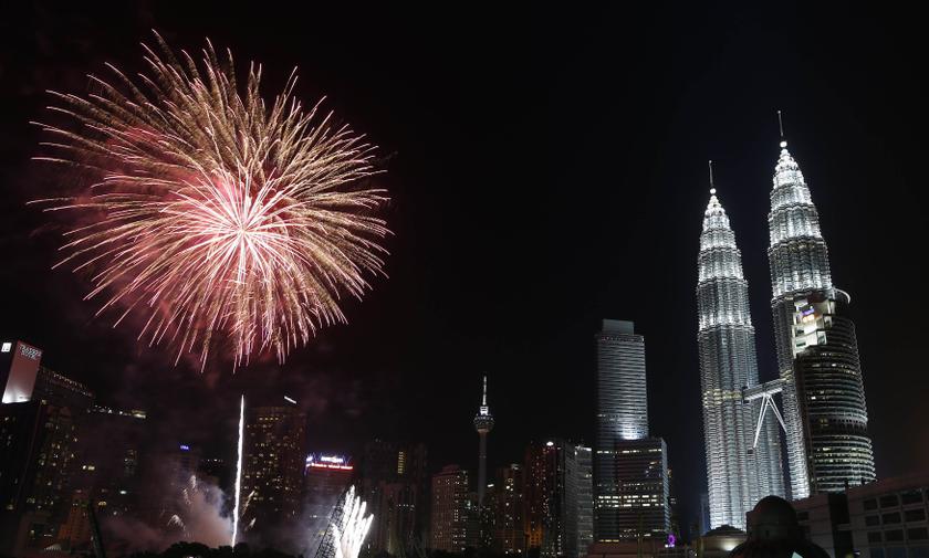Fireworks explode near Malaysia's landmark Petronas Twin Towers during New Year celebrations in Kuala Lumpur January 1, 2014. u00e2u20acu201d Reuters pic