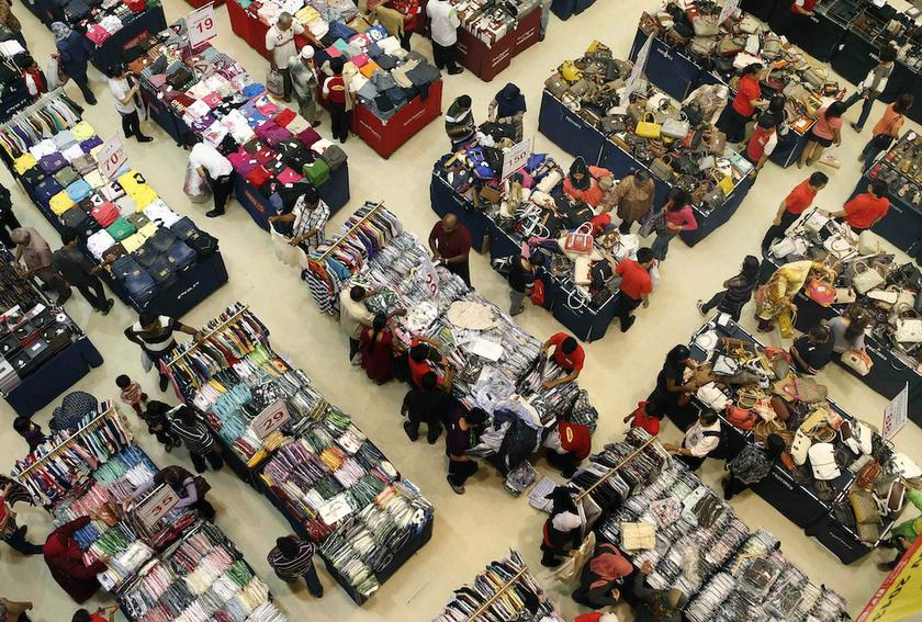 People browse inside a shopping mall in Kuala Lumpur October 23, 2013. u00e2u20acu201d Reuters pic