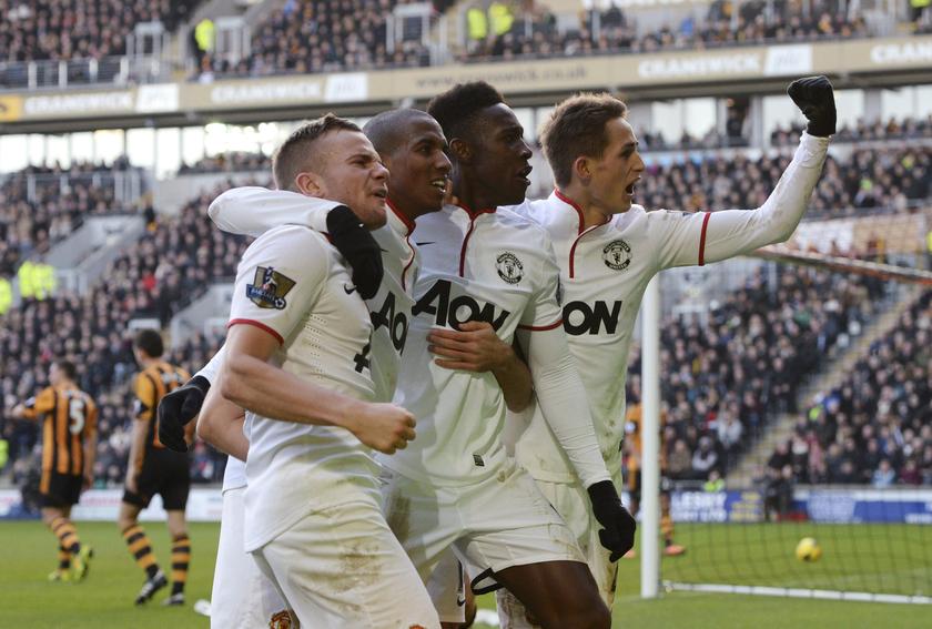 Manchester United players (left to right) Tom Cleverley, Ashley Young, Danny Welbeck and Adnan Januzaj celebrate an own goal by Hull City's James Chester during their English Premier League match at the KC Stadium in Hull, December 26, 2013. u00e2u20acu201d Reuters p