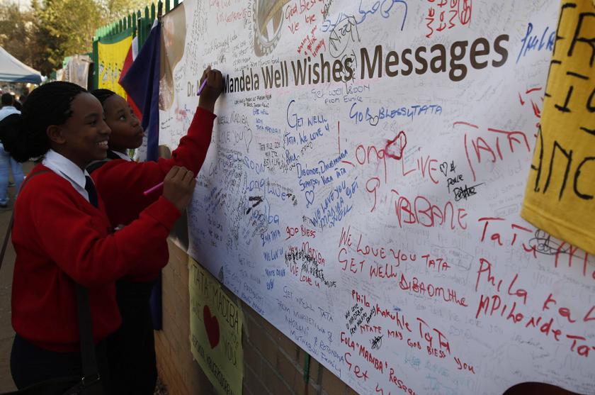Well-wishers write messages of support outside the hospital where former South African President Nelson Mandela is being treated at, in Pretoria July 17, 2013. u00e2u20acu201c Reuters pic