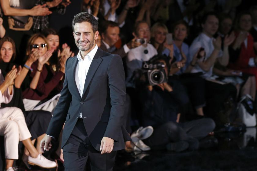 US designer Marc Jacobs appears at the end of his Spring/Summer 2014 women's ready-to-wear fashion show for French fashion house Louis Vuitton during Paris fashion week October 2, 2013. u00e2u20acu201d Reuters pic