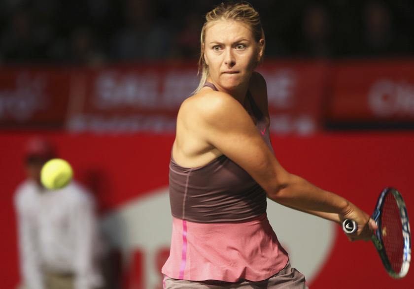 Russia's Maria Sharapova returns a shot to Serbia's Ana Ivanovic during their exhibition match in Bogota December 6, 2013. u00e2u20acu201d Reuters pic