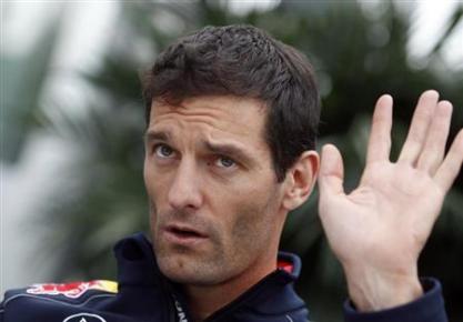 Red Bull Formula One driver Mark Webber of Australia waves from his paddock ahead of the Canadian F1 Grand Prix at the Circuit Gilles Villeneuve in Montreal, June 6, 2013. u00e2u20acu201d Reuters pic