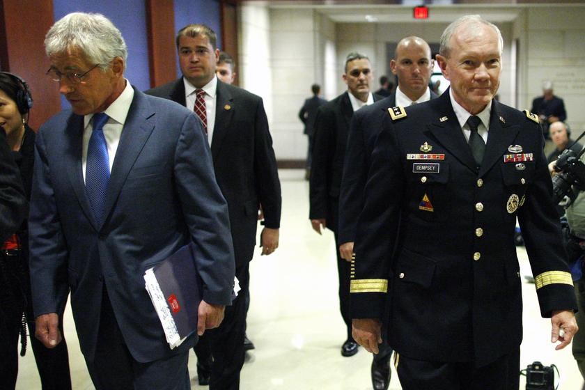 US Defense Secretary Chuck Hagel (left) and Chairman of the Joint Chiefs of Staff US Army General Martin Dempsey (right) arrive to brief members of Congress on proposed military action against Syria in Washington, Sept 9, 2013.  u00e2u20acu201d Reuters pic