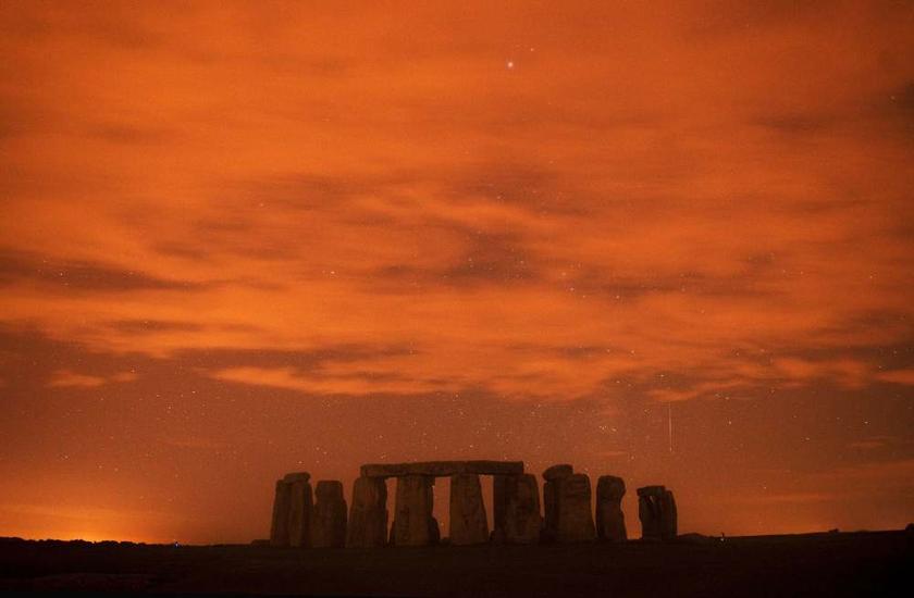 A meteor streaks past stars in the night sky over Stonehenge in Salisbury Plain, England on August 13, 2013. The Perseid meteor shower is sparked every August when the Earth passes through a stream of space debris. u00e2u20acu201d Reuters pic