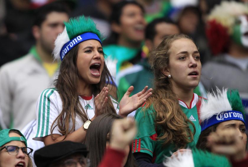 Fans of Mexico react while watching their 2014 World Cup qualifying playoff first leg match against New Zealand at the Azteca stadium in Mexico City November 13, 2013. u00e2u20acu201d Reuters pic