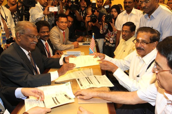 Datuk Seri G.Palanivel and datuk Seri Dr S.Subramaniam file their nomination papers for the MIC presidential election in Kuala Lumpur, September 1, 2013. u00e2u20acu201d Picture by Choo Choy May