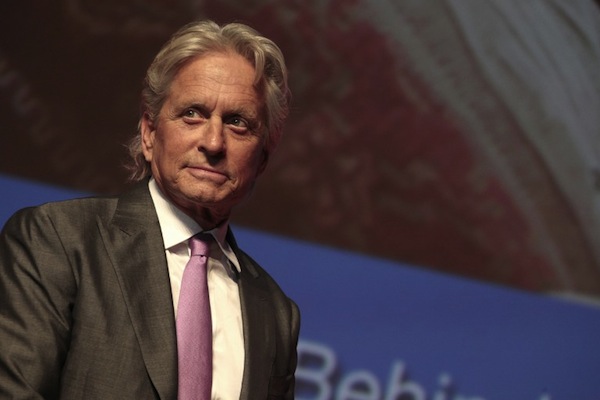 US actor Michael Douglas looks on as he attends the opening ceremony of the 39th edition of the Deauvilleu00e2u20acu2122s US film festival on August 30, 2013 in Deauville, northwestern France. u00e2u20acu201d AFP pic