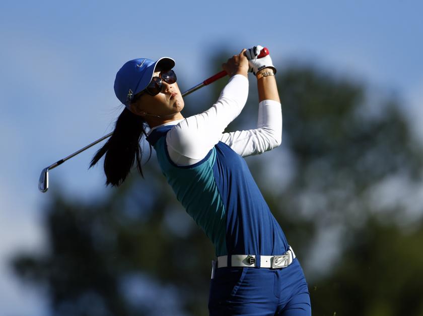 Michelle Wie of the US watches her approach shot on the 13th green during the first round of the women's Evian Championship golf tournament in Evian September 13, 2013. u00e2u20acu201d Reuters pic