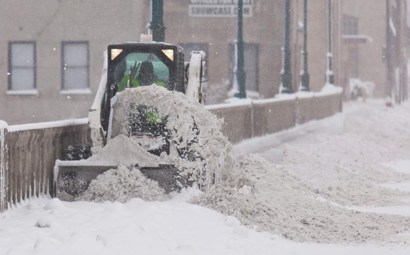 A city employee gestures as he clears a sidewalk, as a winter storm moves across the midwest, in Milwaukee. u00e2u20acu2022 Reuters pic 