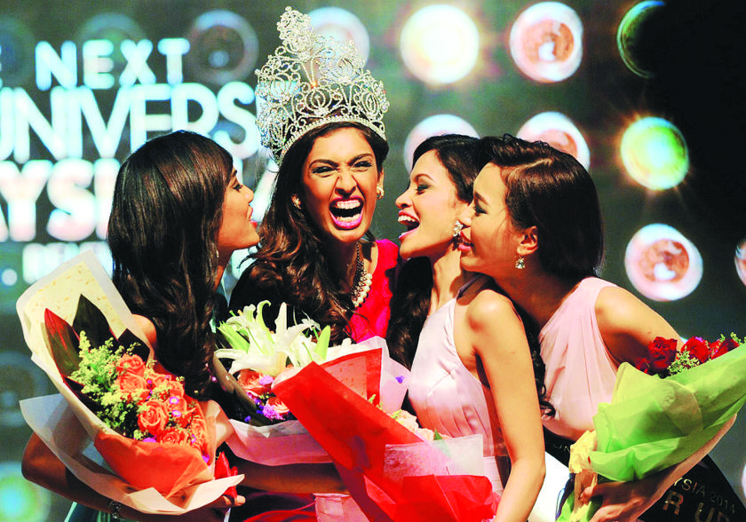 First runner-up Lalitha, Sabrina, second runner-up Kausalya and third runner-up Lyn after the results were announced u00e2u20acu201d Picture by Arif Kartono