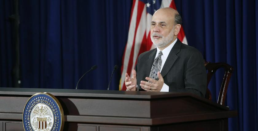 U.S. Federal Reserve Chairman Ben Bernanke responds to reporters at his final planned news conference before his retirement, at the Federal Reserve Bank headquarters in Washington, December 18, 2013 Reuters
