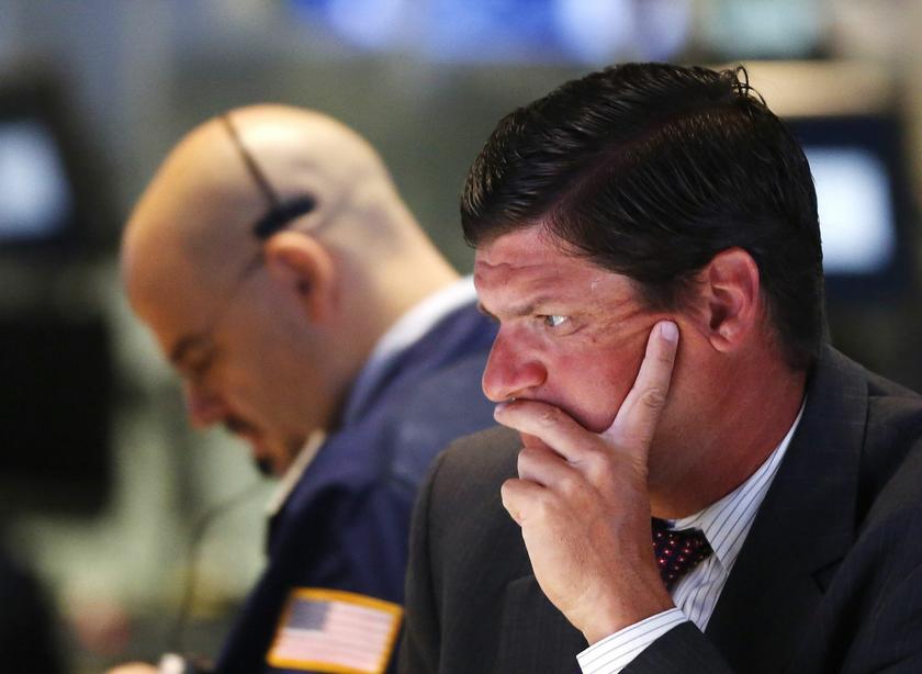 Testing times on the floor of the New York Stock Exchange. — Reuters pic