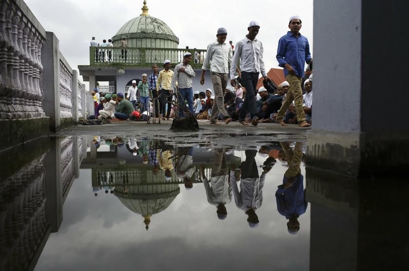Nepali Muslims arrive for the mass prayer during the Eid al-Adha celebrations at the Kashmiri Takiya Jame mosque in Kathmandu October 16, 2013. u00e2u20acu201d Reuters pic