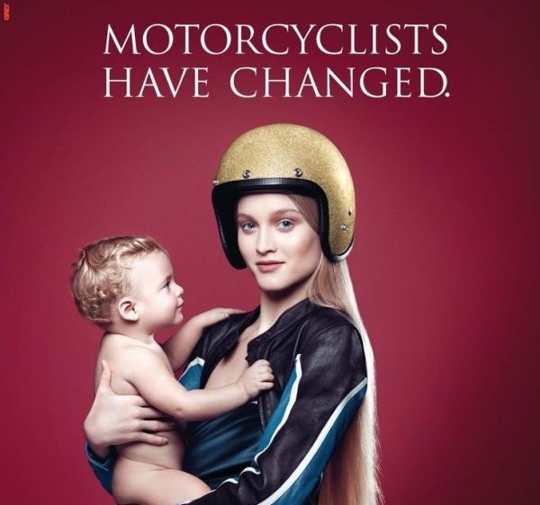 As indicated by the EICMA 2013 poster, motorcycle manufacturers aim to appeal to new demographics, including women. u00e2u20acu201d  AFP pic