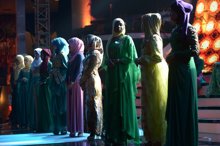 Contestants of the Muslimah World pageant take part in a rehearsal for the grand final of the contest in Jakarta on Sept 18, 2013. u00e2u20acu201d AFP pic