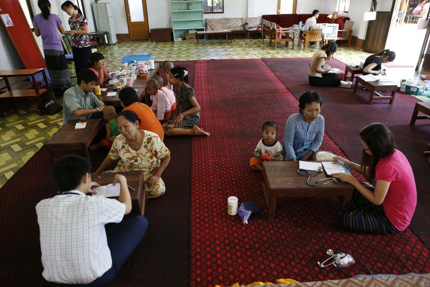 Doctors examine patients in the Healthy Farm charity clinic at a monastery outside Yangon November 2, 2013. u00e2u20acu201d Reuters pic