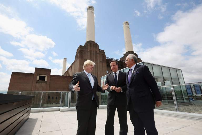 British Prime Minister David Cameron (centre) and the Mayor of London, Boris Johnson (left) meet with Prime Minister Datuk Seri Najib Razak at Battersea Power Station in central London on July 4, 2013. u00e2u20acu201d AFP pic