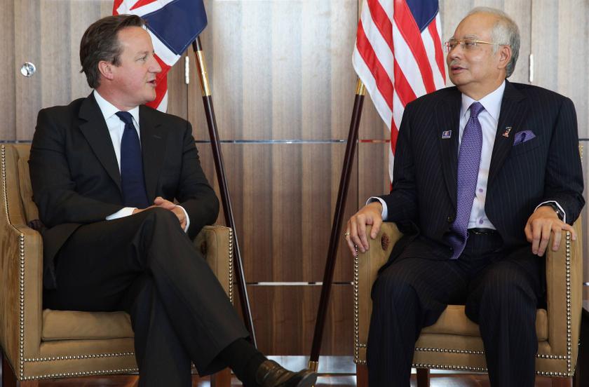 Britain's Prime Minister David Cameron (left) speaks with his Malaysian counterpart, Najib Razak, at Battersea Power Station in London July 4, 2013. u00e2u20acu201c Reuters pic