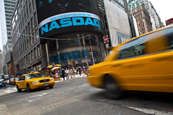Taxi cabs drive past the Nasdaq MarketSite in New Yorku00e2u20acu2122s Times Square, August 23, 2013. u00e2u20acu201d Reuters pic