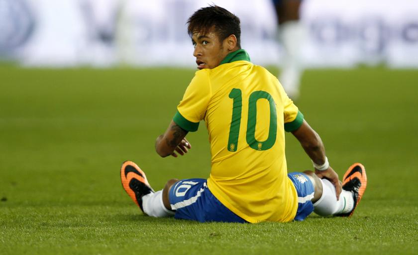 Brazil's Neymar sits on the pitch during their international friendly match against Switzerland at the St. Jakob-Park stadium in Basel August 14, 2013. u00e2u20acu201c Reuters pic