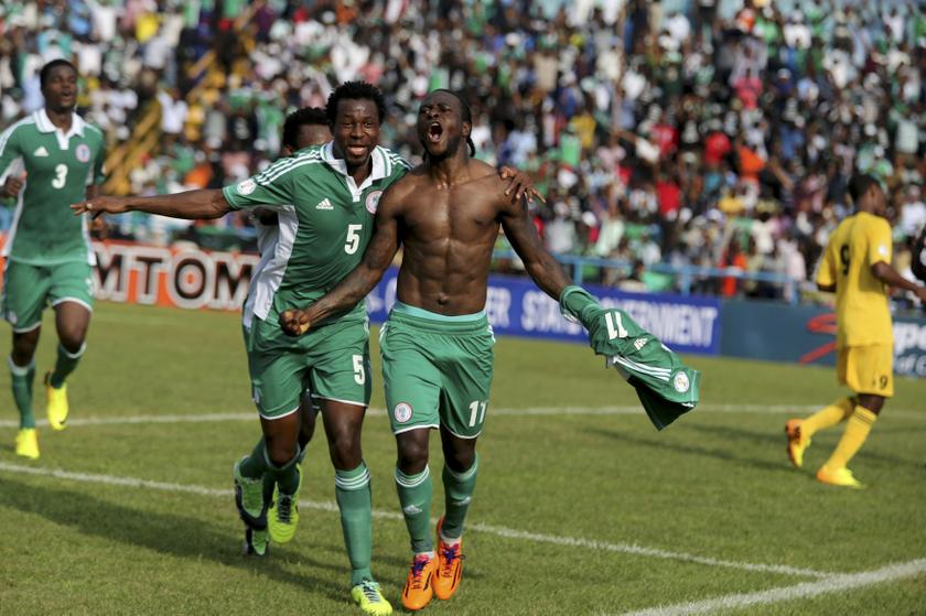 Victor Moses of Nigeria (R) celebrates after scoring a goal against Ethiopia during their 2014 World Cup qualifying playoff soccer match at U.J Esuene stadium in Calabar November 16, 2013. 