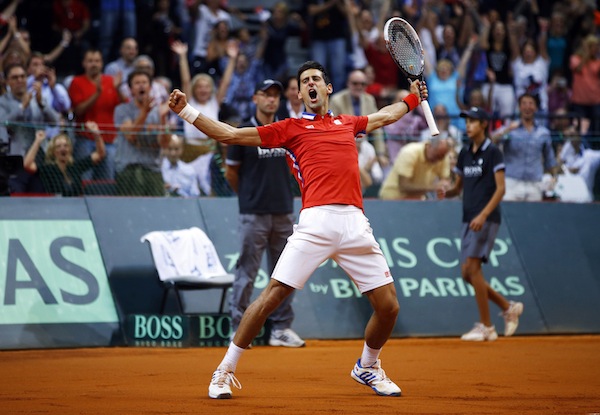Serbiau00e2u20acu2122s Novak Djokovic celebrates his victory over Canadau00e2u20acu2122s Milos Raonic after their Davis Cup semi-final tennis match in Belgrade September 15, 2013. u00e2u20acu201d Reuters pic