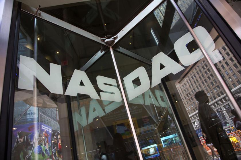 A security officer stands guard outside the Nasdaq MarketSite in New York's Times Square, August 23, 2013. u00e2u20acu201c Reuters pic