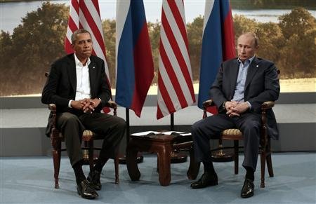 A grim-looking Obama (left) meets an equally grim-looking Putin during the G8 Summit at Lough Erne in Enniskillen on June 17, 2013. — Reuters pic