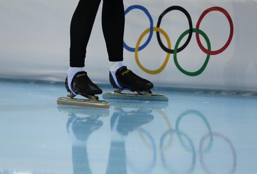 A skater passes the Olympic rings during speedskating team practice at the Adler Arena in preparation for the 2014 Winter Olympics in Sochi, February 2, 2014. u00e2u20acu201d Reuters pic