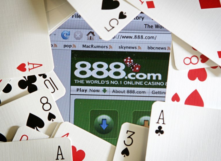 The online gambling website of 888 holdings is pictured surrounded by a deck of cards in London, 06 November 2006. u00e2u20acu201d AFP pic