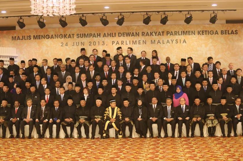 Barisan Nasional and Pakatan Rakyat MPs take a group photograph after they were sworn in for the 13th Parliament in Kuala Lumpur on June 24, 2013. u00e2u20acu201d Picture by Choo Choy May
