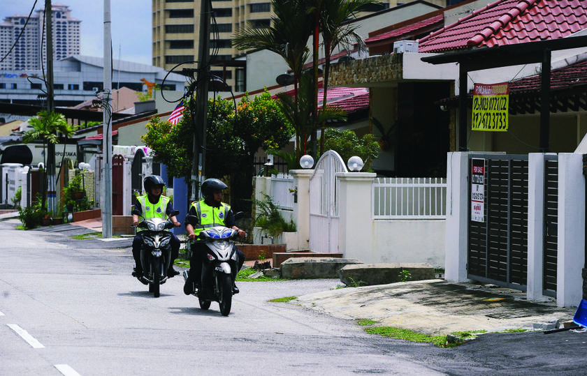 TTDI police patrolling the neighbourhood. u00e2u20acu201d Picture by Shahir Omar