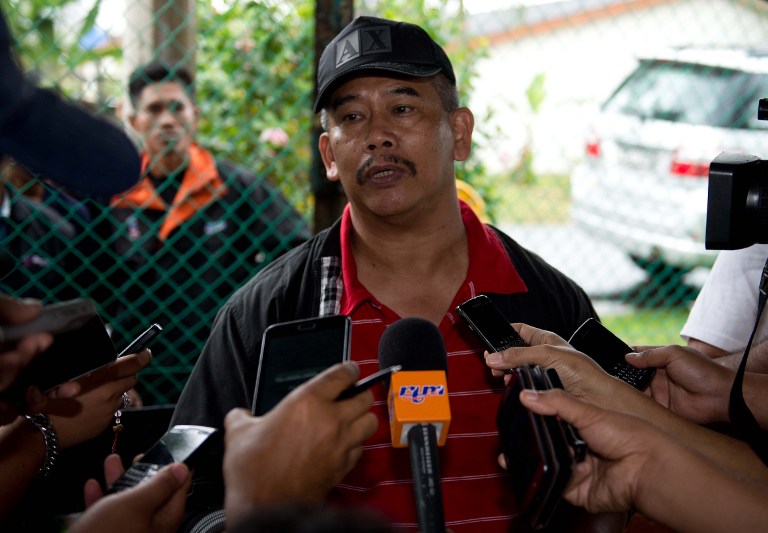 Sabah State Police Commissioner Datuk Hamza Taib listens to questions during a press conference in a village of Sahabat 16, near Lahad Datu, on the Malaysian island of Borneo on February 17, 2013. u00e2u20acu201c AFP pic