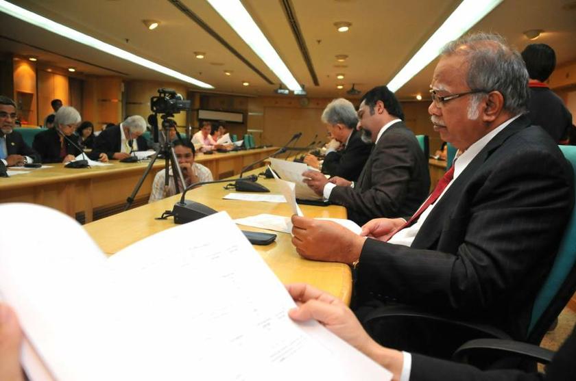 Penang state assemblymen going through their asset declaration forms on August 6, 2013. u00e2u20acu201d Picture by K.E. Ooi