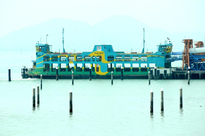 A Penang ferry taking passenger at the ferry terminal. — Picture by KE Ooi
