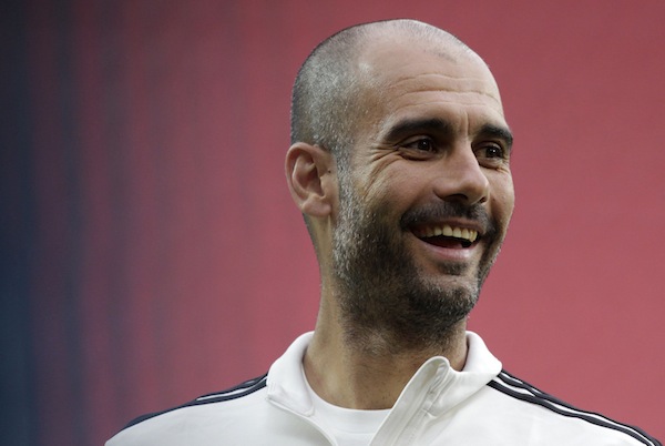 Bayern Munichu00e2u20acu2122s head coach Pep Guardiola smiles during the teamu00e2u20acu2122s practice session in Prague August 29, 2013. u00e2u20acu201d Reuters pic