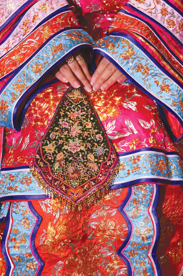 Look closer at the intricate and colourful details of this traditional Nyonya attire