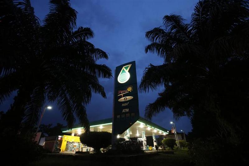 The Petronas logo is seen at one of its petrol outlets in Putrajaya outside Kuala Lumpur December 8, 2012. u00e2u20acu201c Reuters pic