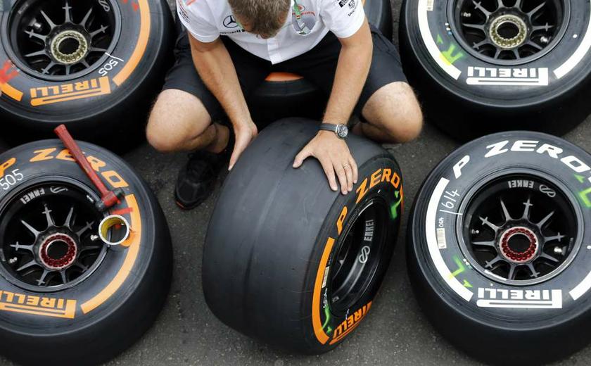 A McLaren Formula One technician checks Pirelli tyres ahead of this weekendu00e2u20acu2122s Belgian F1 Grand Prix in Spa-Francorchamps on August 22, 2013. u00e2u20acu201d Reuters pic