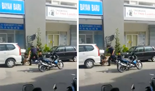A screen grab from the video purportedly showing a policeman slapping a foreigner in Bayan Baru.