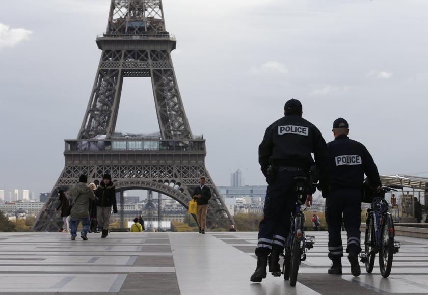 French police officers patrol in front of the Eiffel Tower in Paris, November 19, 2013. u00e2u20acu201d Reuters pic