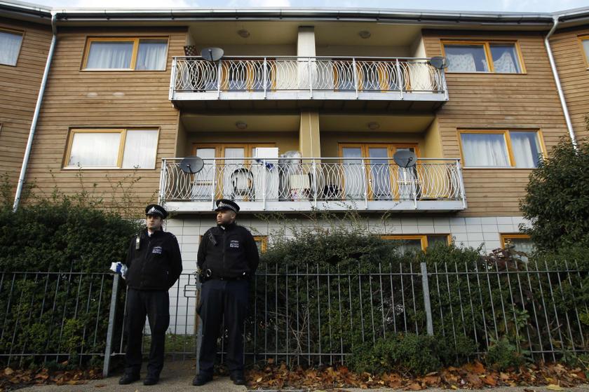 Police stand guard in front of a property in Lambeth, south London November 23, 2013. u00e2u20acu201d Reuters pic