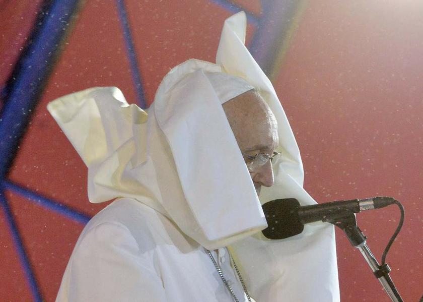 A gust of wind blows Pope Francisu00e2u20acu2122 mantle while celebrating mass with thousands of youths on Copacabana Beach in Rio de Janeiro on July, 25, 2013. u00e2u20acu201d Reuters pic