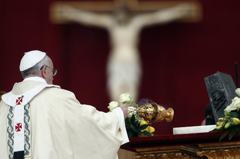 Pope Francis blesses the relics of the Apostle Peter on the altar during a mass at St. Peter's Square at the Vatican November 24, 2013. u00e2u20acu201d Reuters pic